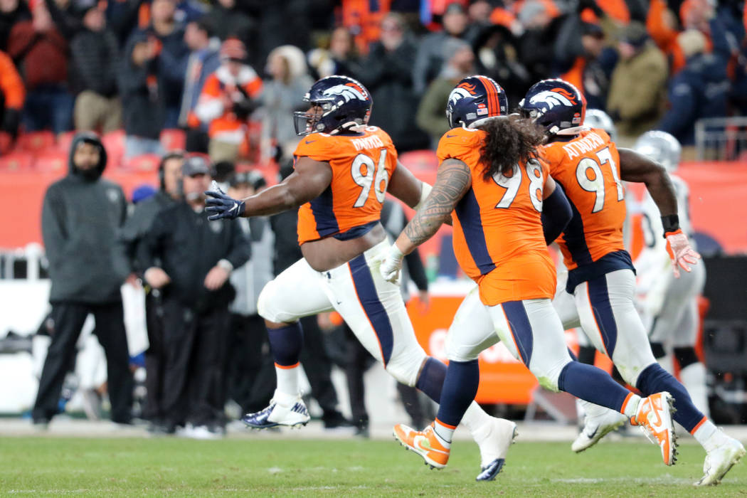 Denver Broncos defensive tackle Shelby Harris (96) celebrates his break up of Oakland Raiders w ...