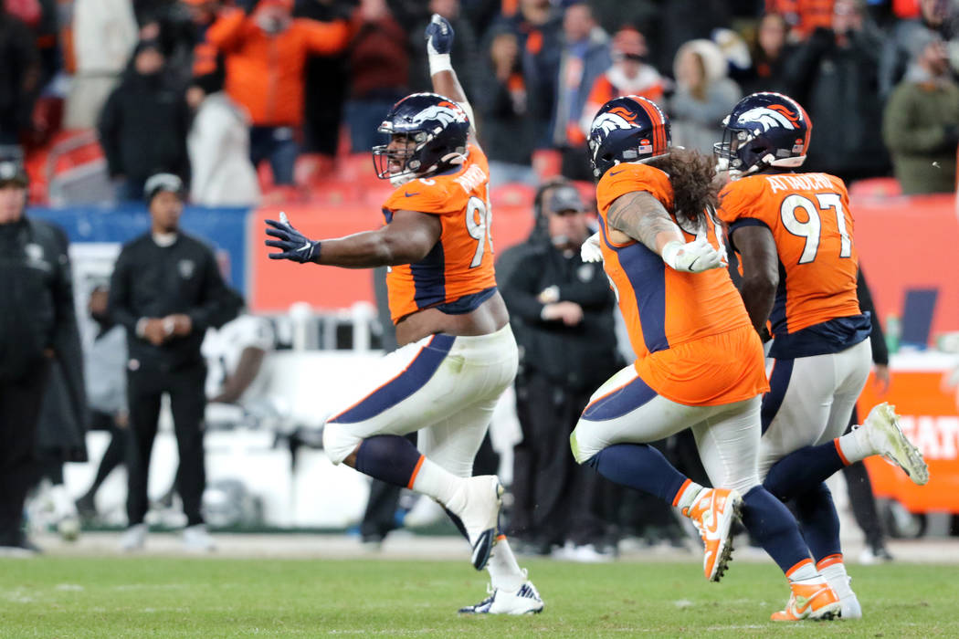 Denver Broncos defensive tackle Shelby Harris (96) celebrates his break up of Oakland Raiders w ...