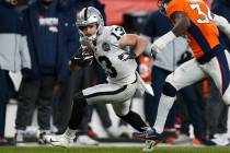 Oakland Raiders wide receiver Hunter Renfrow runs with the ball during the second half of an NF ...
