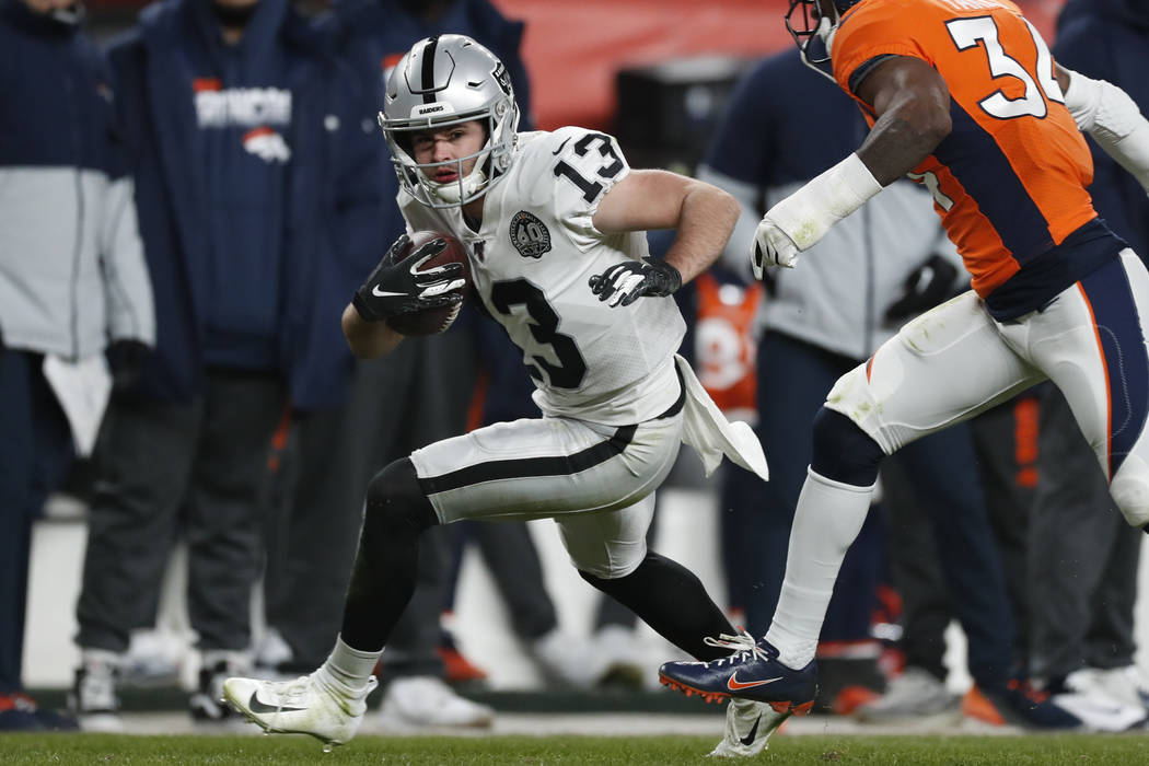 Oakland Raiders wide receiver Hunter Renfrow runs with the ball during the second half of an NF ...