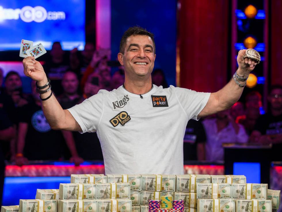 Hossein Ensan, from Germany, celebrates after winning the World Series of Poker Main Event on W ...