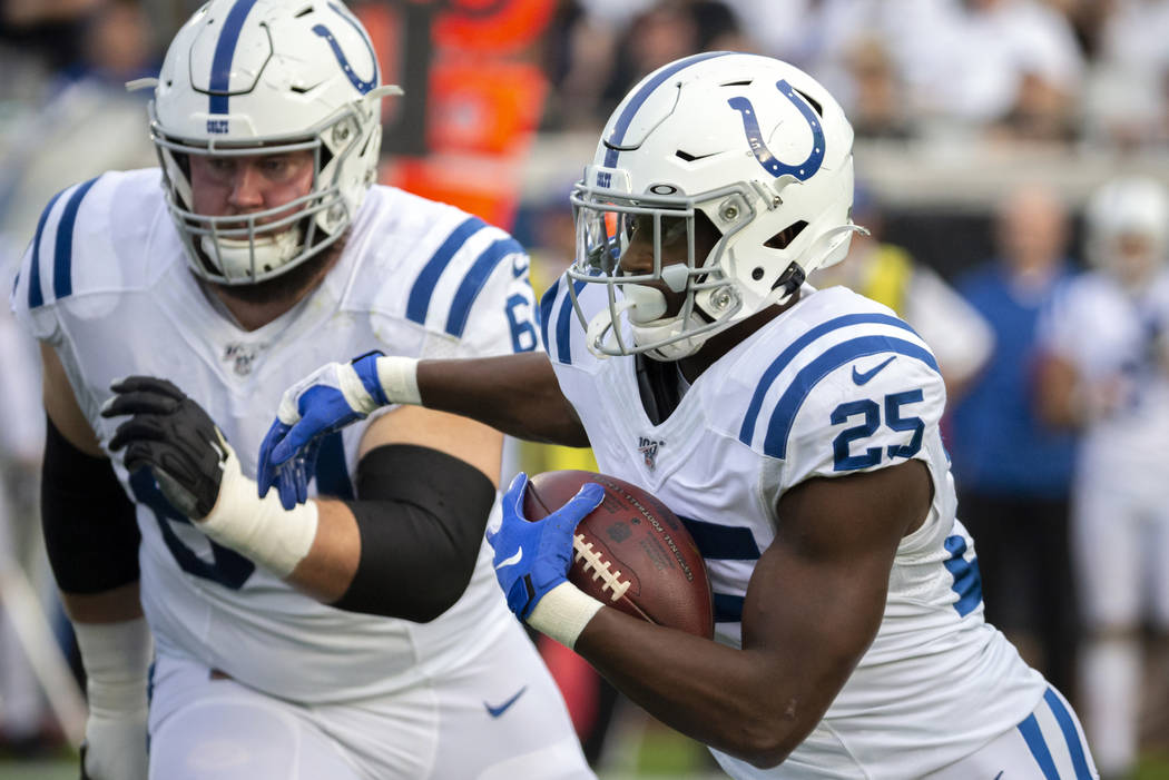 Indianapolis Colts running back Marlon Mack (25) runs for yardage against the Jacksonville Jagu ...