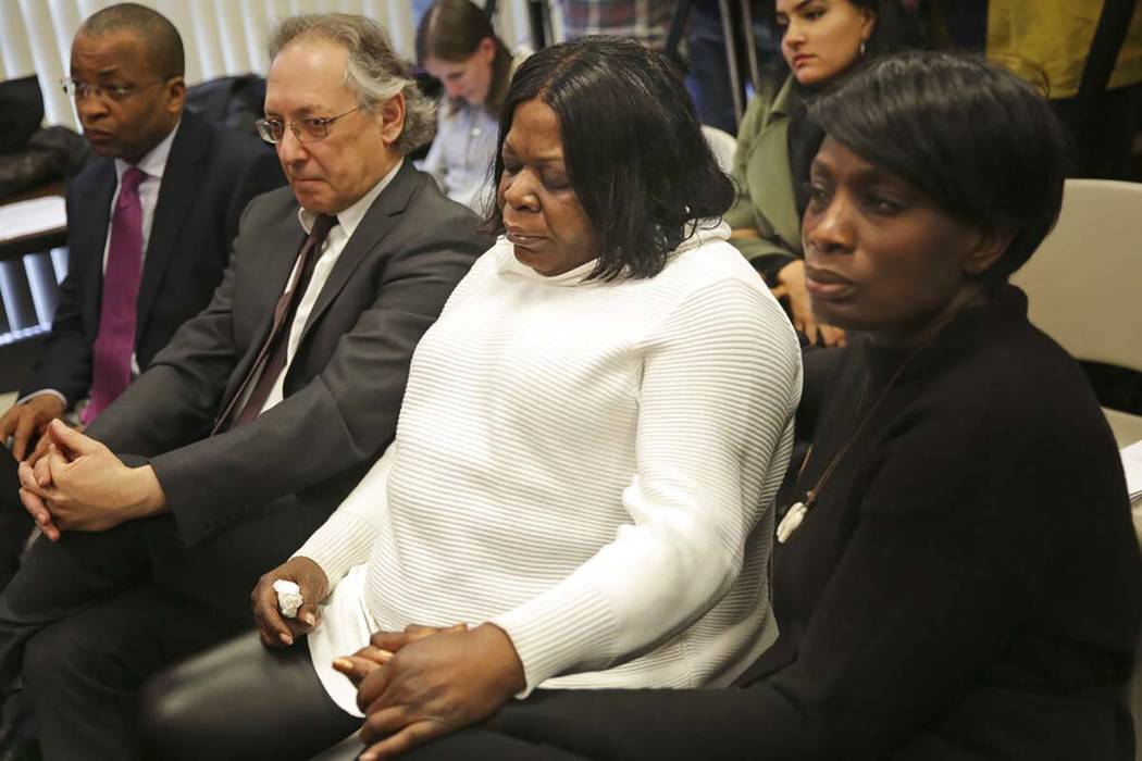 Kim Thomas, center, mother of Grafton Thomas, the man accused of stabbing multiple people at a ...