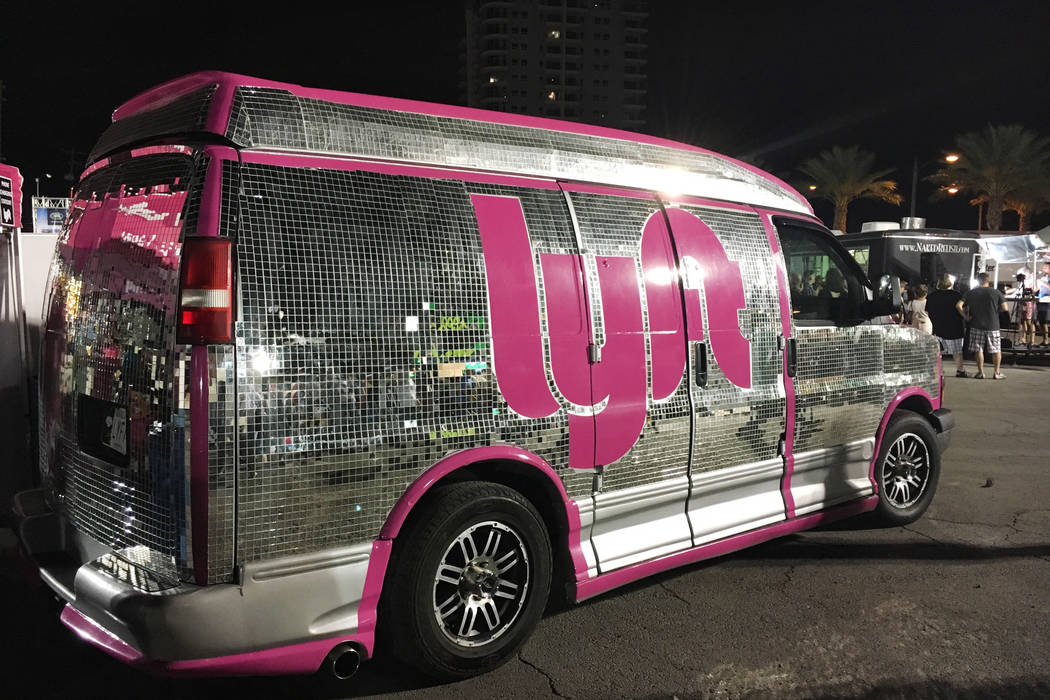 A Lyft van sits outside at First Friday in downtown Las Vegas in 2016. (Las Vegas Review-Journa ...