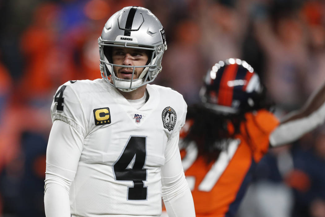 Oakland Raiders quarterback Derek Carr reacts after missing a two-point attempt during the seco ...