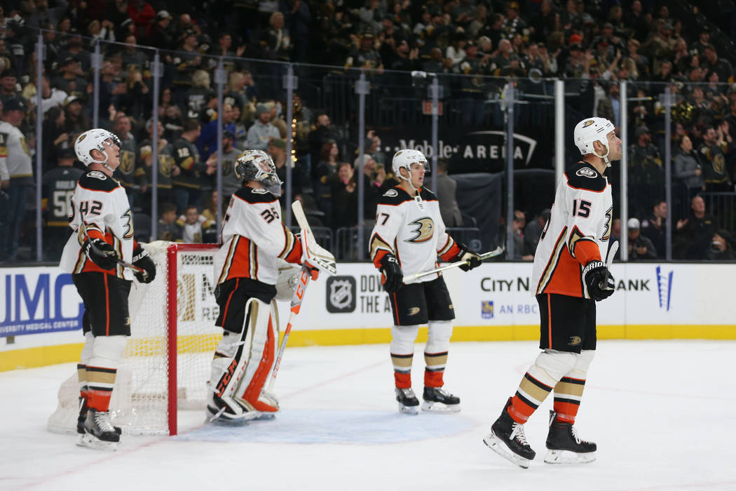 Anaheim Ducks players reacts to a score by Vegas Golden Knights right wing Alex Tuch (89) durin ...