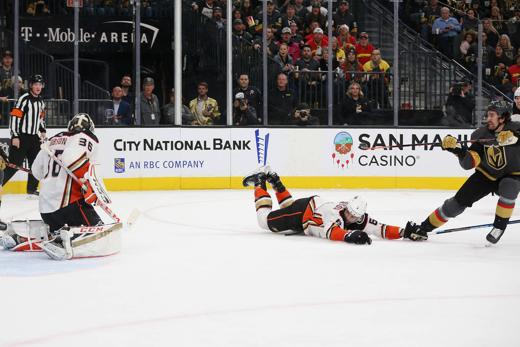Vegas Golden Knights right wing Mark Stone (61) shoots for a score against Anaheim Ducks defens ...
