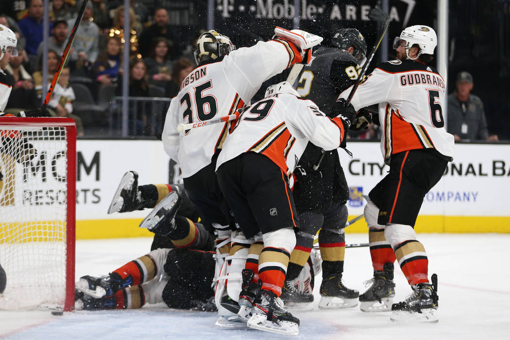 Players from both Vegas Golden Knights and Anaheim Ducks get into a scuffle during the third pe ...