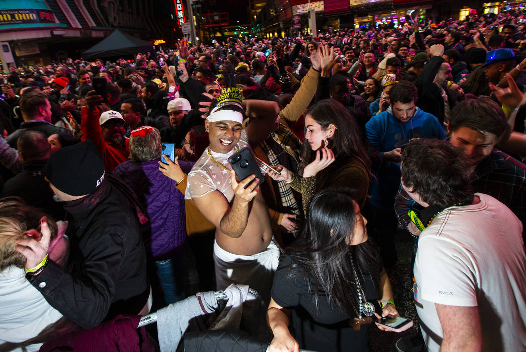 Revelers celebrate during a New Year's party at the Fremont Street Experience in downtown Las V ...