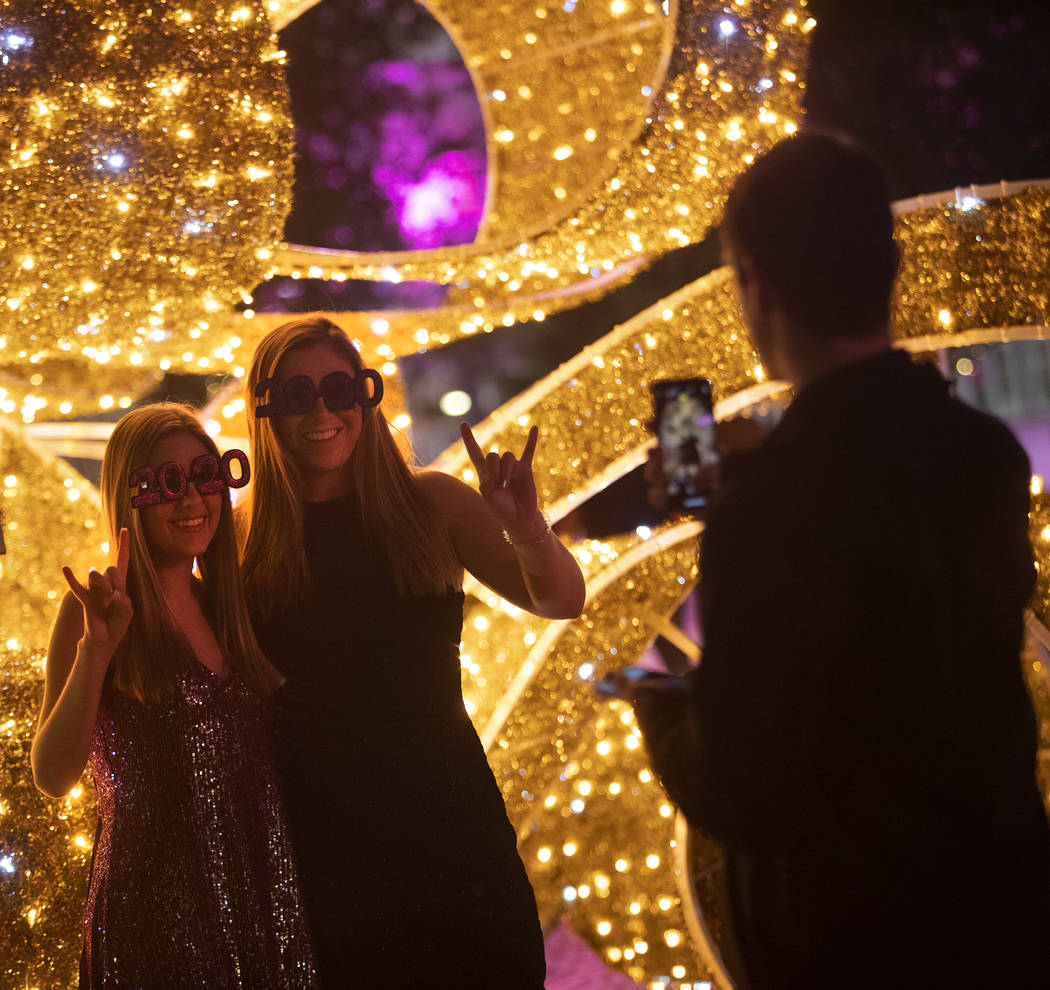 Michelle Southerland, left, of Houston, Texas, and her friend Megan Simpson, of Las Vegas, pose ...