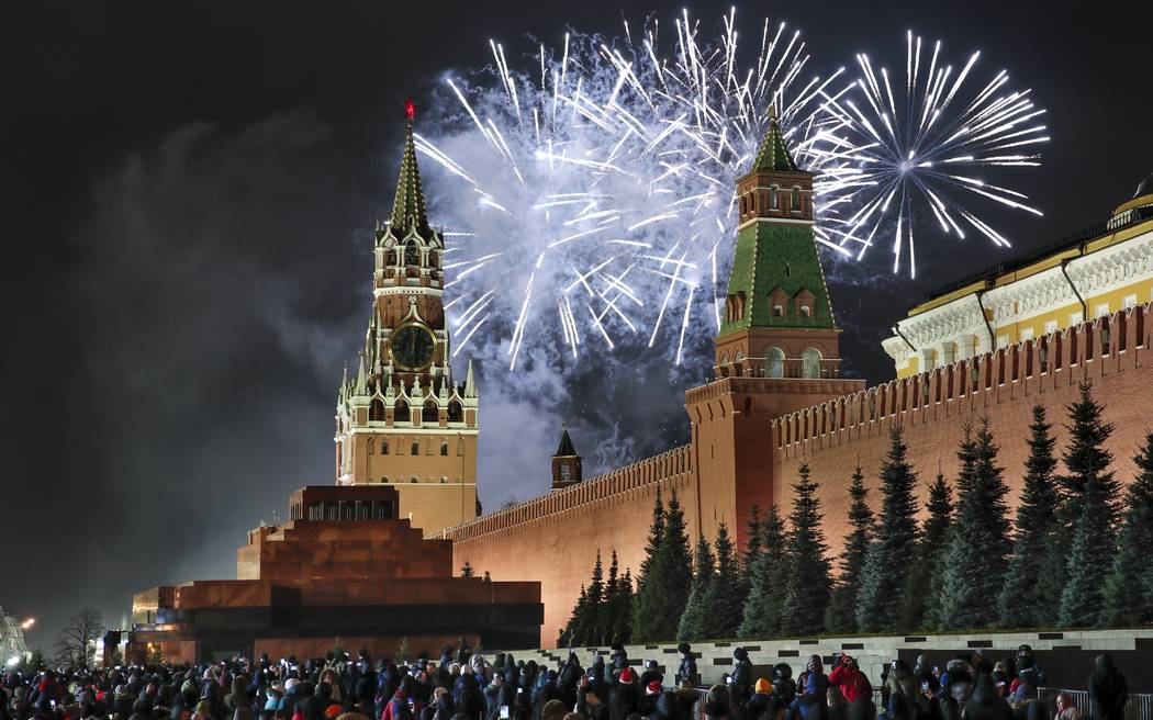 Fireworks explode over the Kremlin during New Year's celebrations in Red Square with the Spassk ...