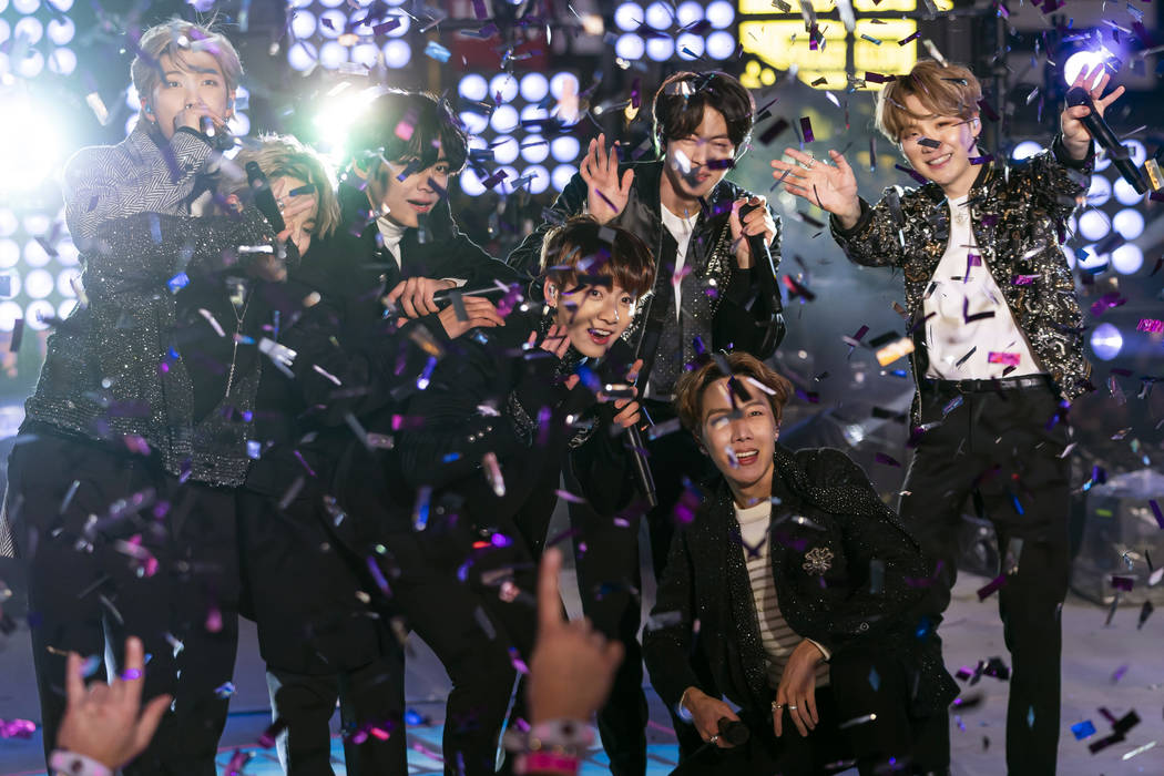 BTS perform at the Times Square New Year's Eve celebration on Tuesday, Dec. 31, 2019, in New Yo ...