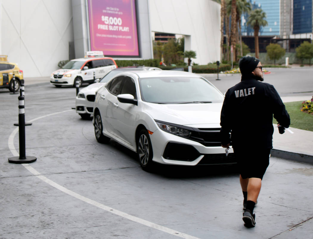 Valet runner Joel Tejada works at the Sahara Las Vegas in Las Vegas on Friday, Dec. 20, 2019. E ...