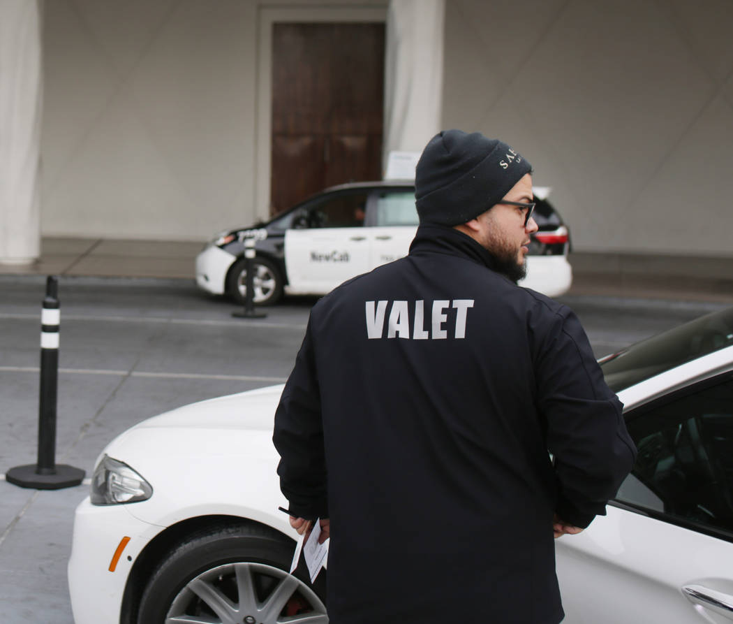 Valet runner Joel Tejada takes care of a guest at the Sahara Las Vegas in Las Vegas on Friday, ...