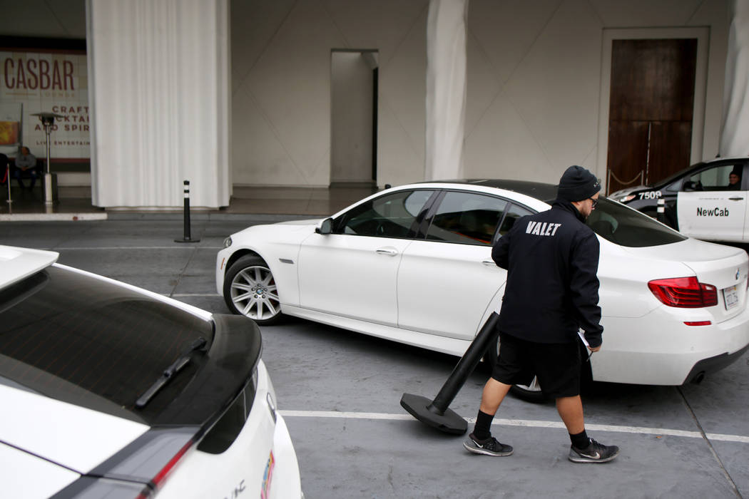 Valet runner Joel Tejada helps a guest after retrieving their vehicle at the Sahara Las Vegas o ...