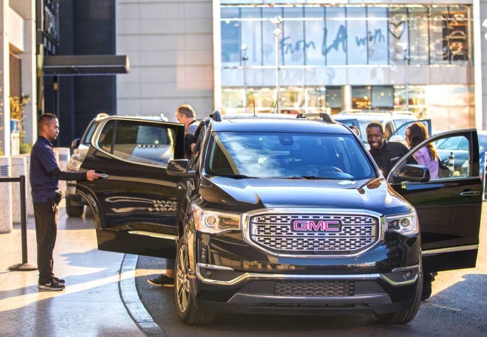 Mark Reolegio, left, and Desean Frazier valet cars outside The Capital Grille on Wednesday, Feb ...