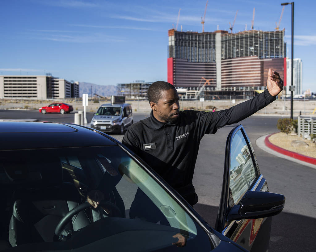 Desean Frazier valets cars outside The Capital Grille on Wednesday, Feb. 27, 2019, at Fashion S ...