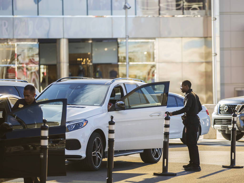 Mark Reolegio, left, and Desean Frazier valet cars outside The Capital Grille on Wednesday, Feb ...