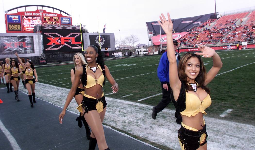 Las Vegas Outlaws Cheerleaders including, from right, Kiushin, Mya and Marcy wave and smile at ...