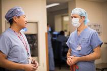 Dr. Eddy Luh, left, speaks with Dr. Oussama “Sam” Hajal, right, who worked for mo ...