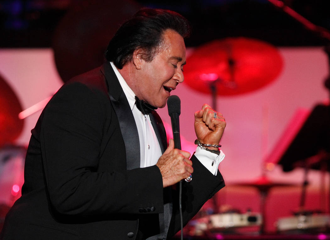 Entertainer Wayne Newton performs during the opening night of his limited-engagement production ...