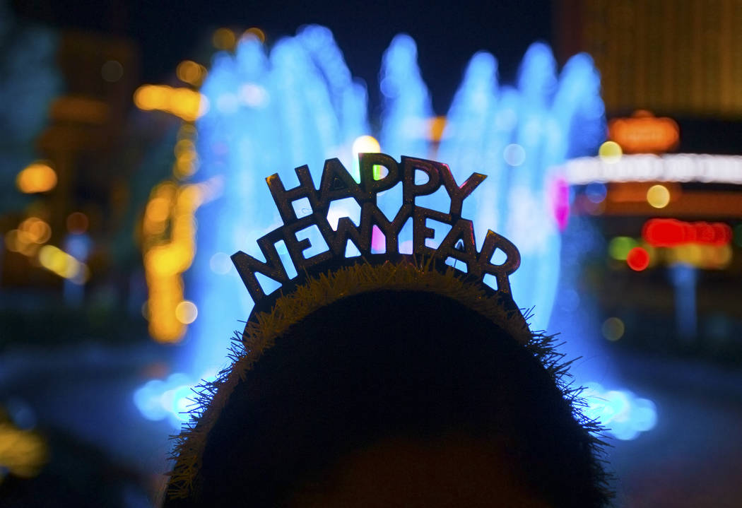 Fatima Peña, from Napa, Calif., enjoys the fountains outside Wynn Las Vegas on the Strip o ...