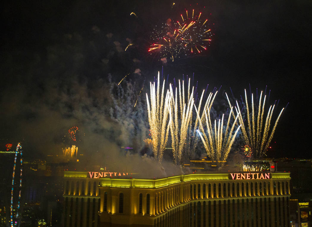 Fireworks light up the sky above The Venetian on the Strip on Wednesday, Jan. 1, 2020, in Las V ...