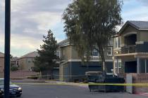Crime scene tape surrounds Atlas Apartment Homes on Madre Mesa Drive in northwest Las Vegas on ...