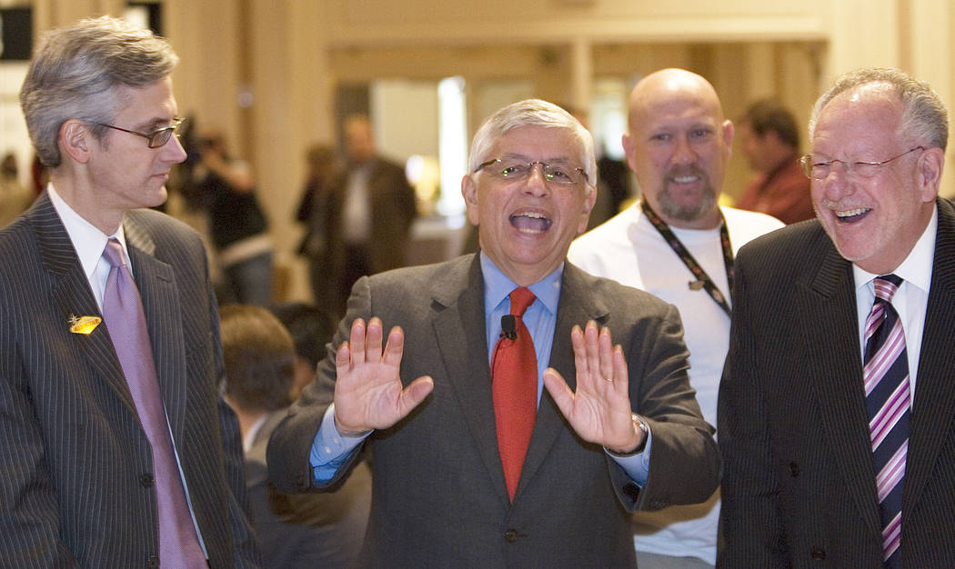 NBA Commissioner David Stern, center, talks to Clark County Commissioner Rory Reid, left, and L ...