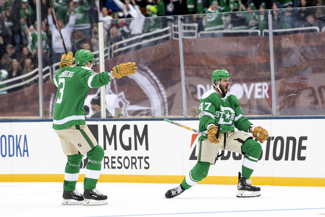 Dallas Stars right wing Alexander Radulov (47) celebrates his goal with defenseman John Klingbe ...