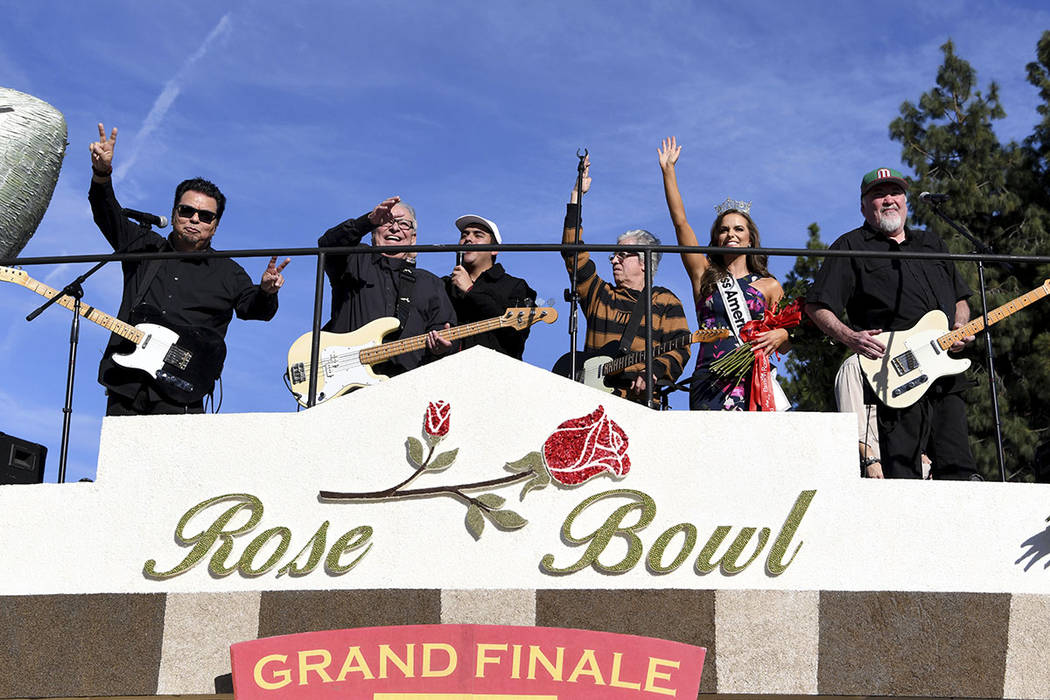 The band Los Lobos performs on the Wells Fargo float at the 131st Rose Parade in Pasadena, Cali ...