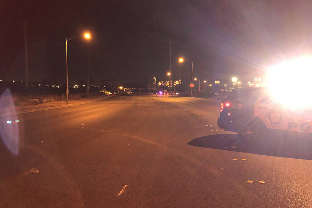 Police respond to a crash Wednesday, Jan. 1, 2020, near North Stephanie Street and East Russell ...