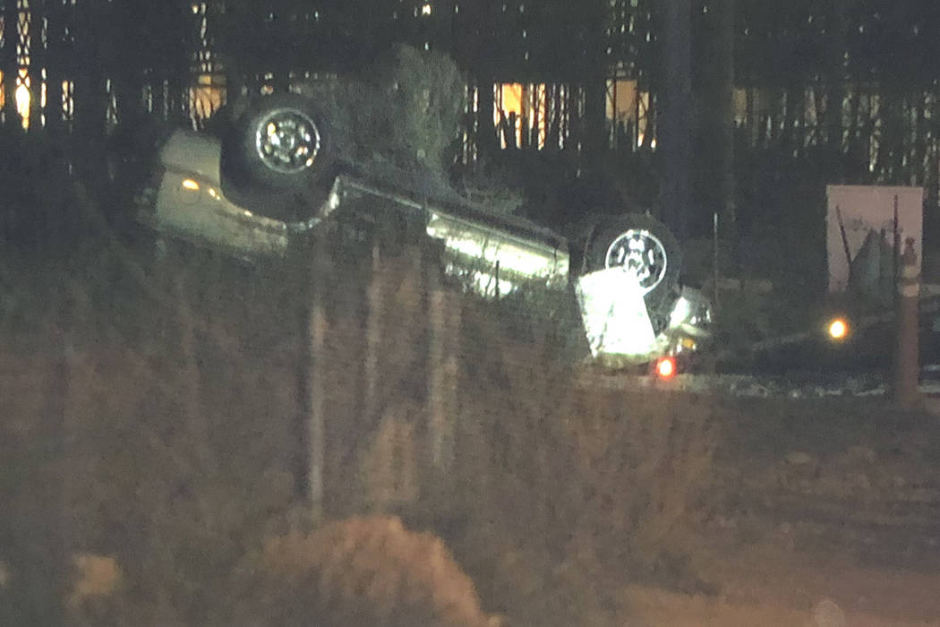 Police respond to a crash Wednesday, Jan. 1, 2020, near North Stephanie Street and East Russell ...