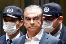 In this April 25, 2019, file photo, former Nissan Chairman Carlos Ghosn leaves Tokyo's Detenti ...