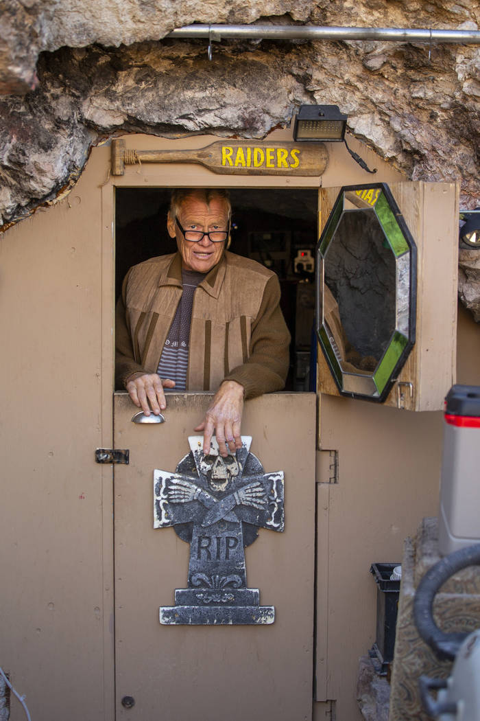 Richard Roman, at his front door, has for for seven years now lived in a former mine in the hil ...