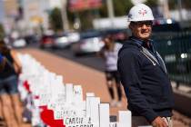 Greg Zanis stands by the 58 crosses he placed near the "Welcome to Fabulous Las Vegas&quot ...