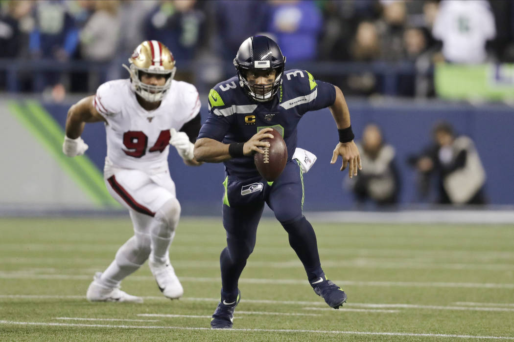 Seattle Seahawks quarterback Russell Wilson in action against the San Francisco 49ers during th ...