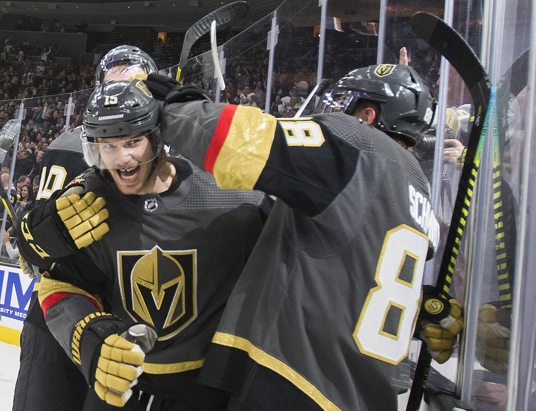 Vegas Golden Knights defenseman Jon Merrill (15) celebrates with Vegas Golden Knights defensema ...