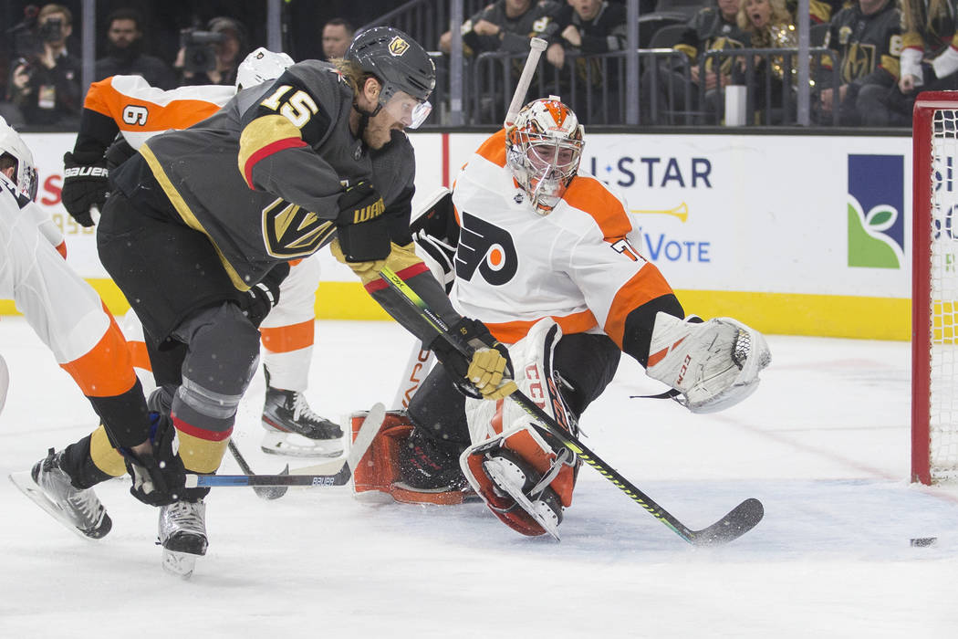 Vegas Golden Knights defenseman Jon Merrill (15) scores a first period goal against Philadelphi ...