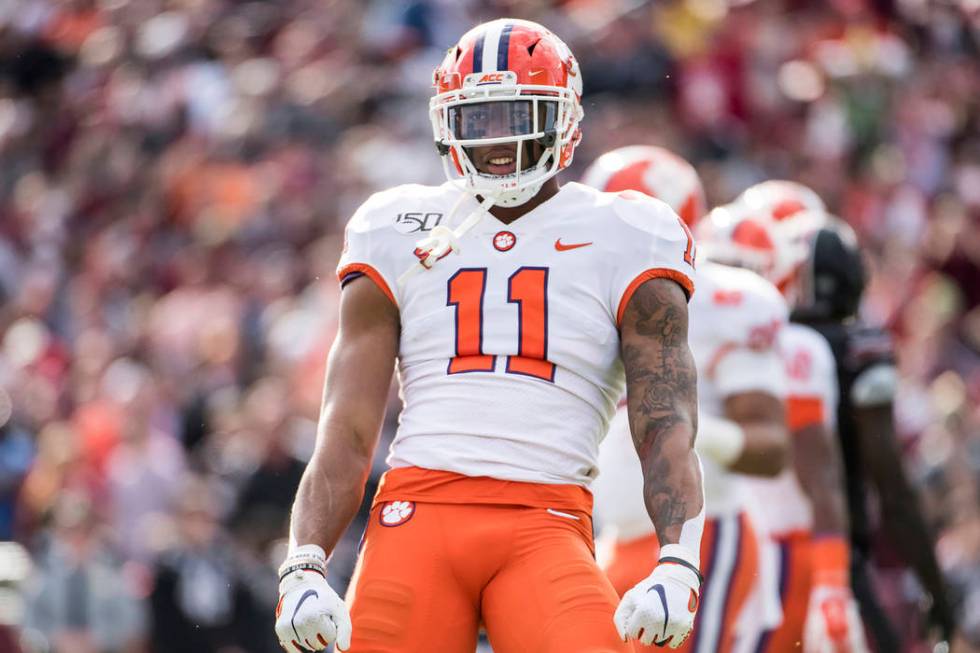 FILE - In this Nov. 30, 2019, file photo, Clemson linebacker Isaiah Simmons (11) celebrates a s ...