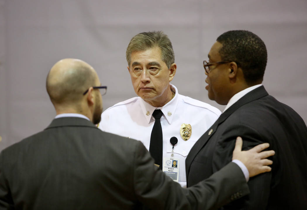 Las Vegas City Ward 1 councilman Brian Knudsen, left, Las Vegas Fire Marshal Robert Nolan, cent ...