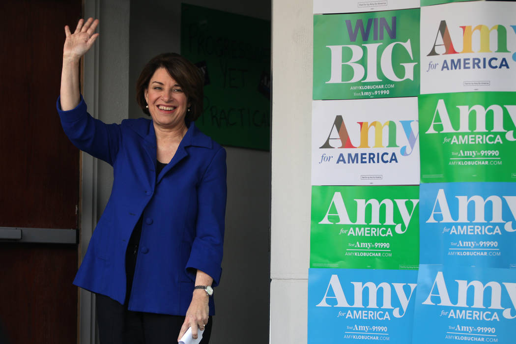 Democratic presidential candidate Amy Klobuchar makes her entrance during a campaign rally at h ...