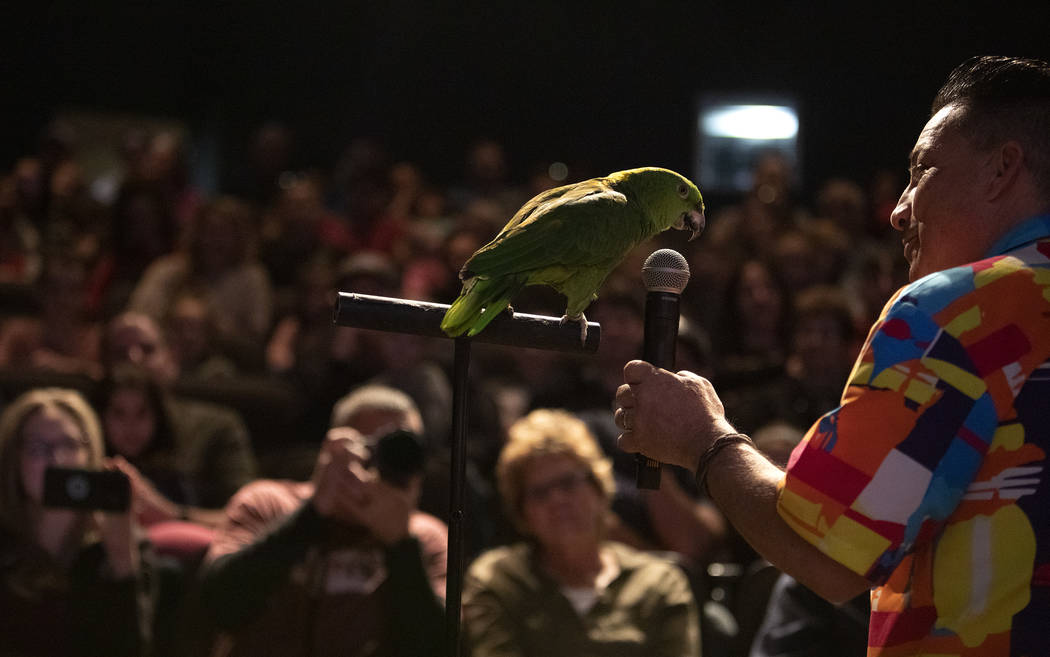 Clint Carvalho has his parrot Beatrice sing a song at his Extreme Parrots show at Springs Prese ...
