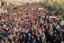 Protesters demonstrate over the U.S. airstrike in Iraq that killed Iranian Revolutionary Guard ...