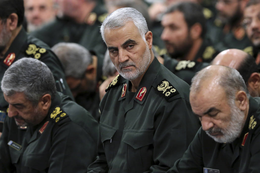 Revolutionary Guard Gen. Qassem Soleimani, center, attends a meeting in Tehran, Iran, Sept. 18, ...