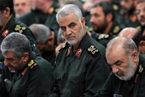 Revolutionary Guard Gen. Qassem Soleimani, center, attends a meeting in Tehran, Iran, Sept. 18, ...