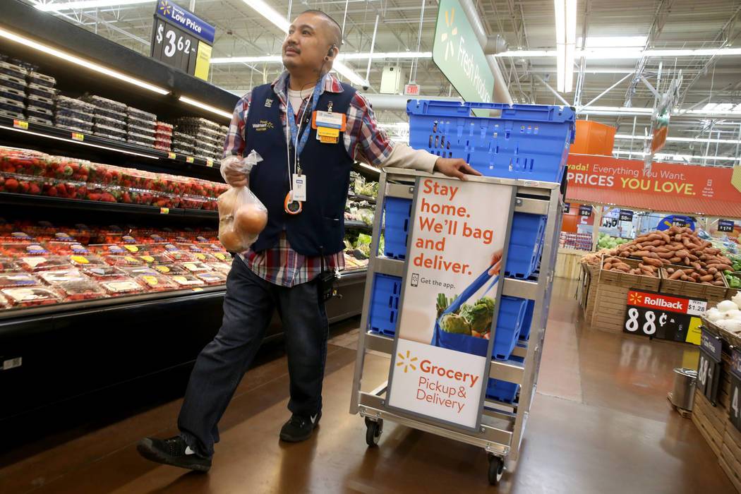 Personal shopper Melvin Oasay fills customer orders for