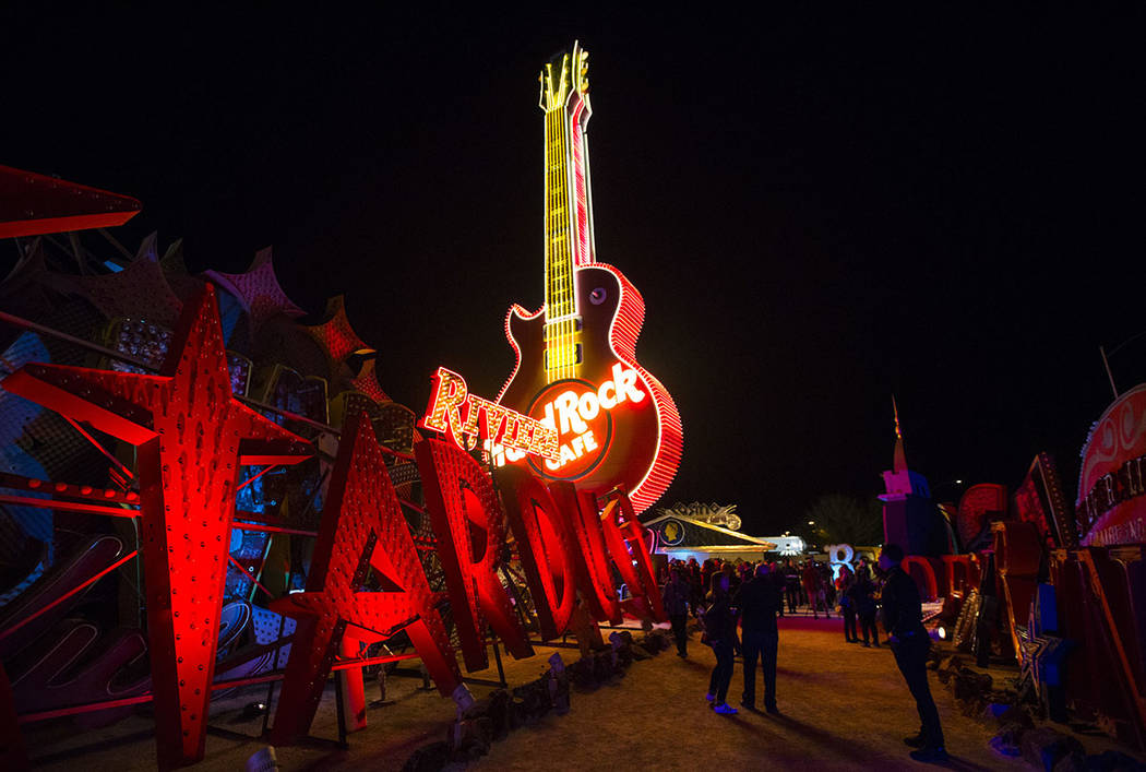 The Hard Rock Cafe guitar sign is illuminated for the first time in public during a special eve ...