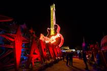 The Hard Rock Cafe guitar sign is illuminated for the first time in public during a special eve ...