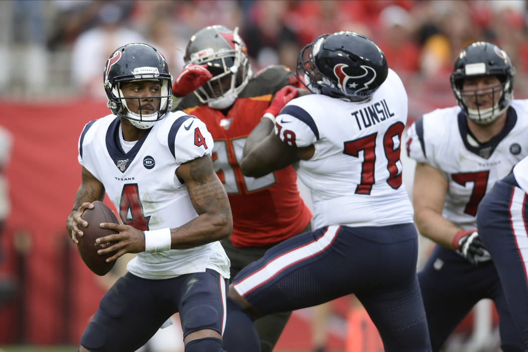 Houston Texans quarterback Deshaun Watson (4) looks to pass against the Tampa Bay Buccaneers du ...